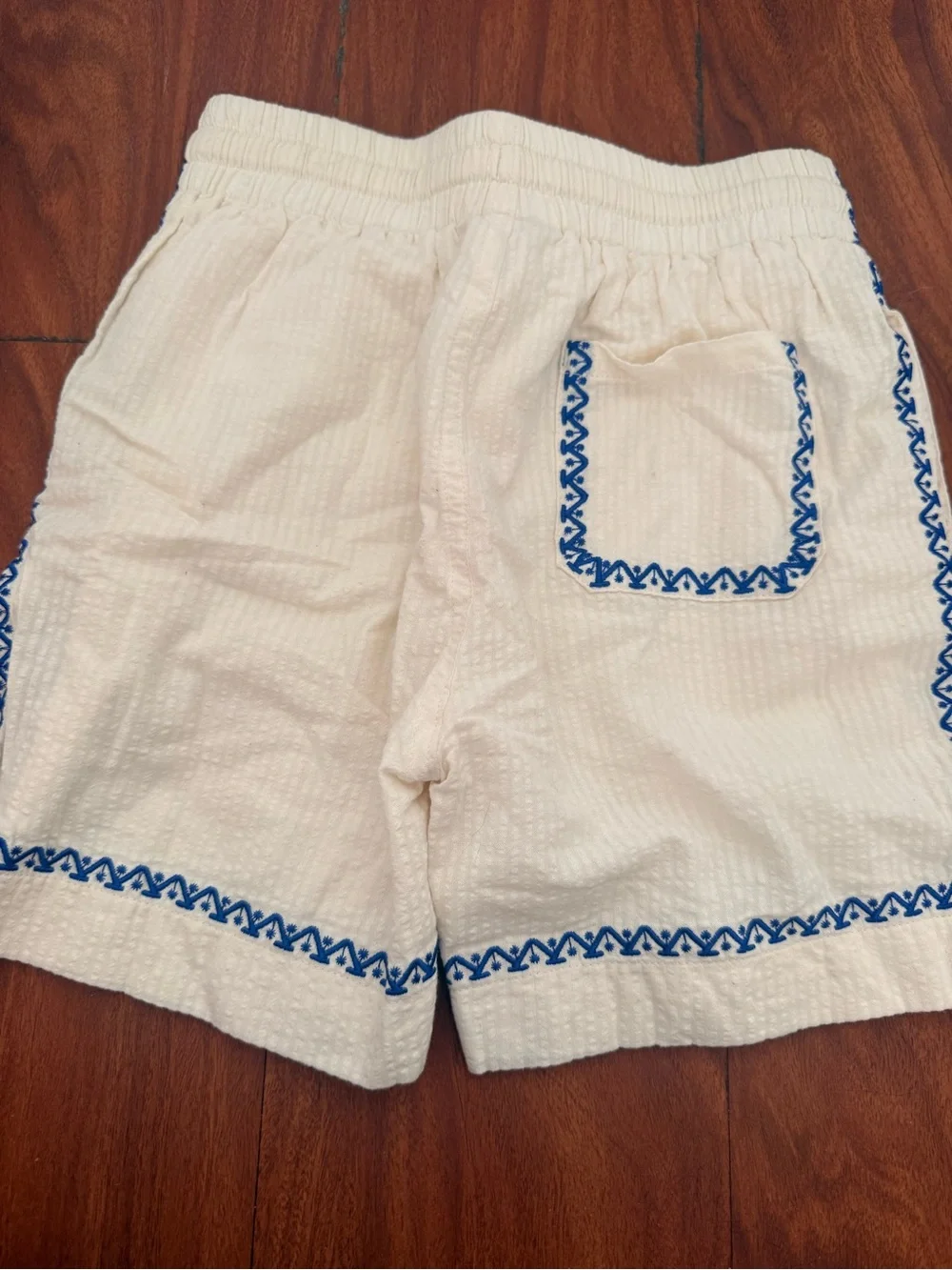 Kith Kids Cream Shorts with Blue Embroidery